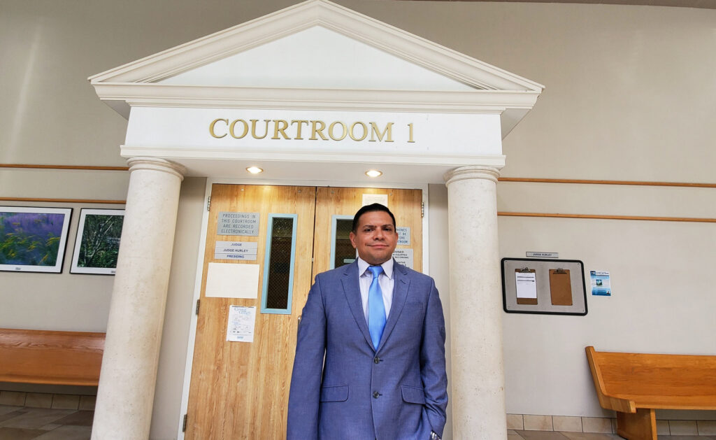 José O. Castañeda, Jr. standing outside Courtroom 1 at the Broward County North Regional Courthouse in Deerfield Beach, Florida.